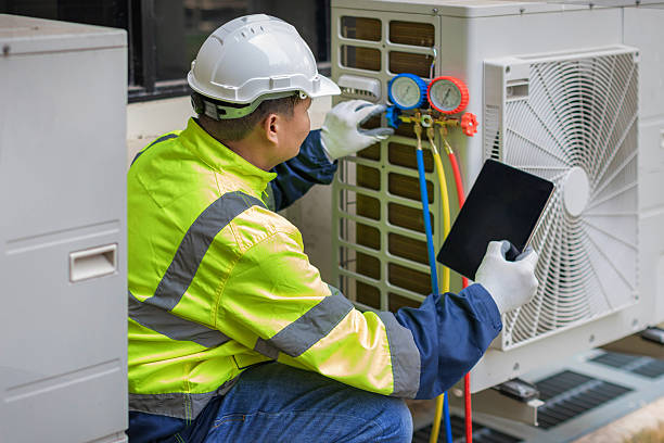 Professional Air Conditioning Repair technician working in Greenville, IN